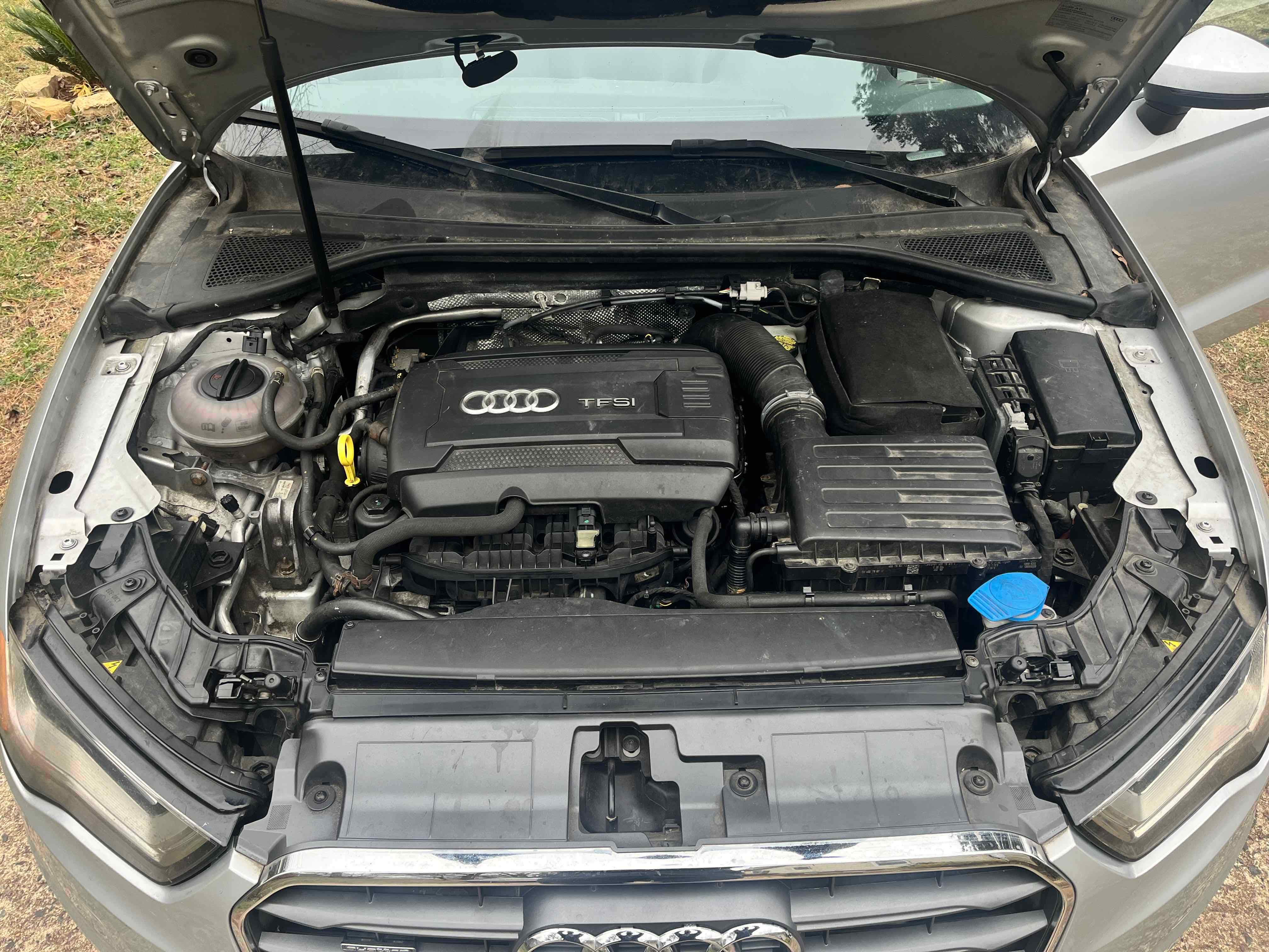 Open vehicle engine bay before